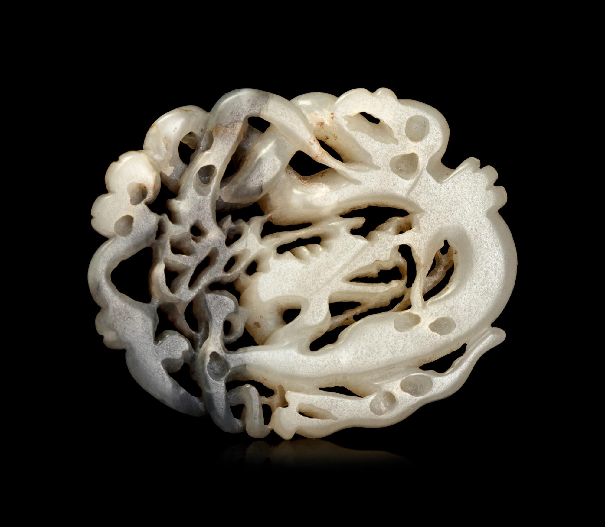 A Grey and White Jade Carving of Double Dragons