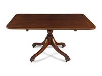 A Regency Part Ebonized Mahogany Brass-Inlaid Breakfast Table