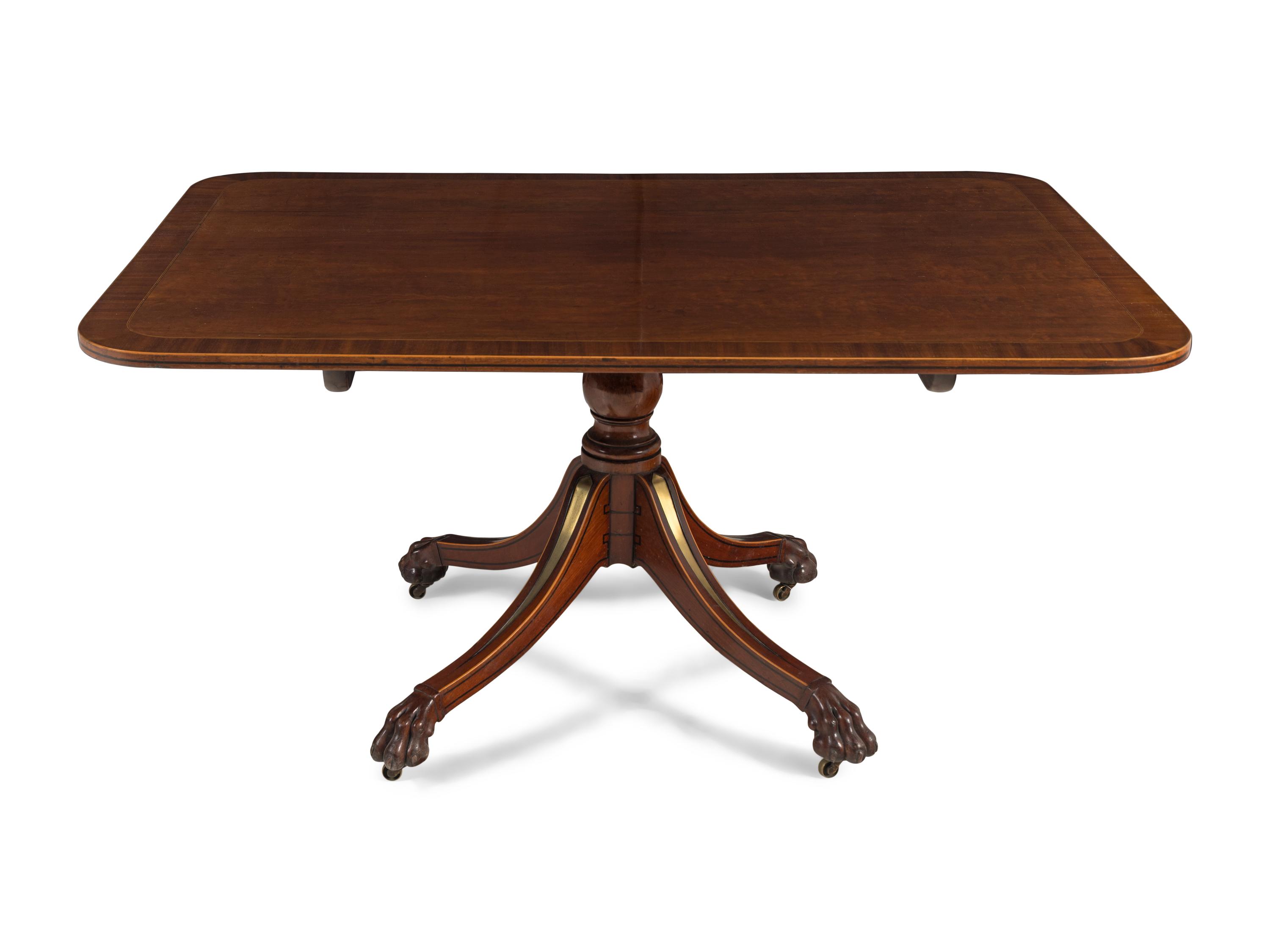 A Regency Part Ebonized Mahogany Brass-Inlaid Breakfast Table