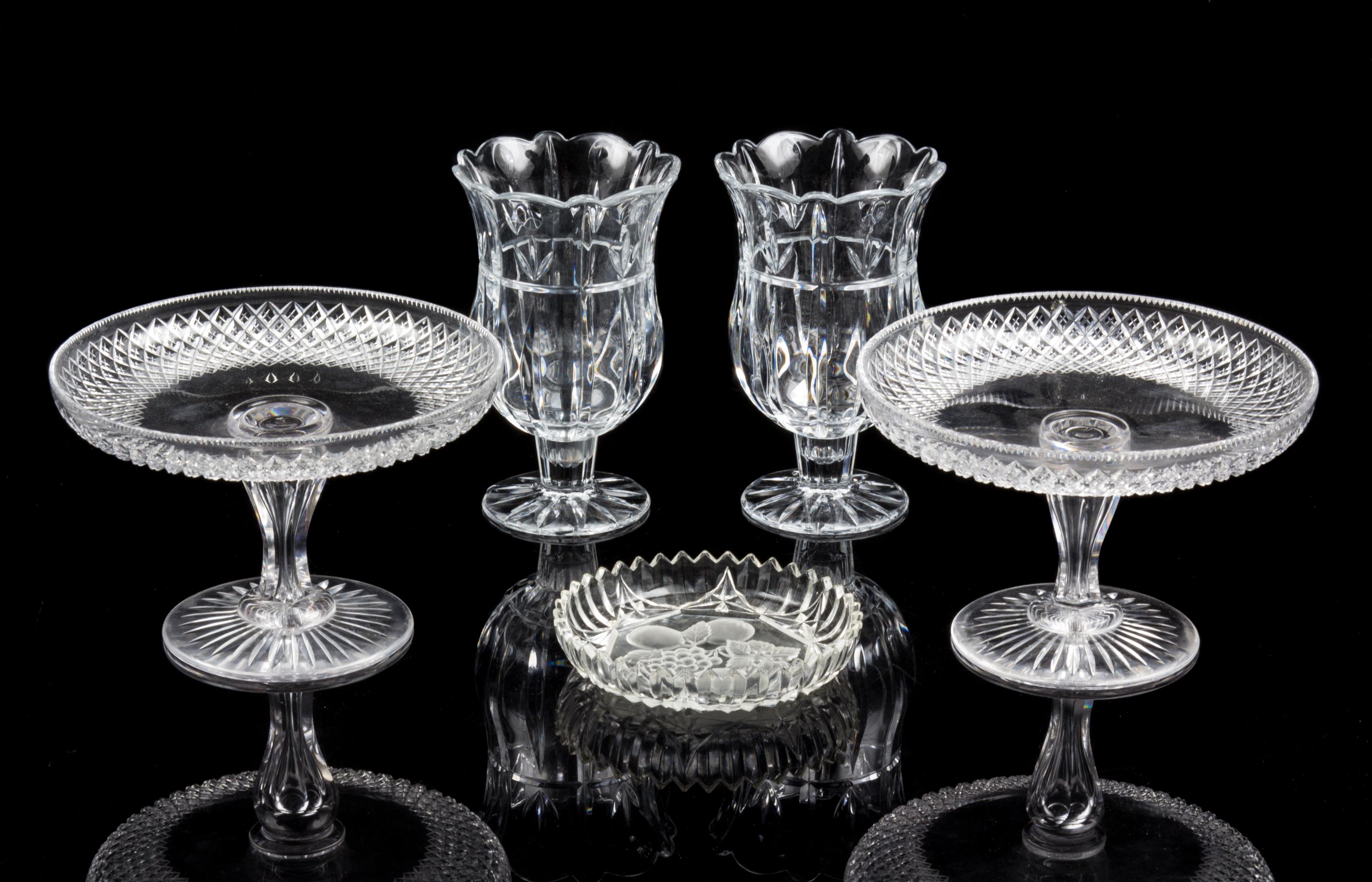 A Pair of Glass Compotes Height 5 1/4 x diameter 8 inches.