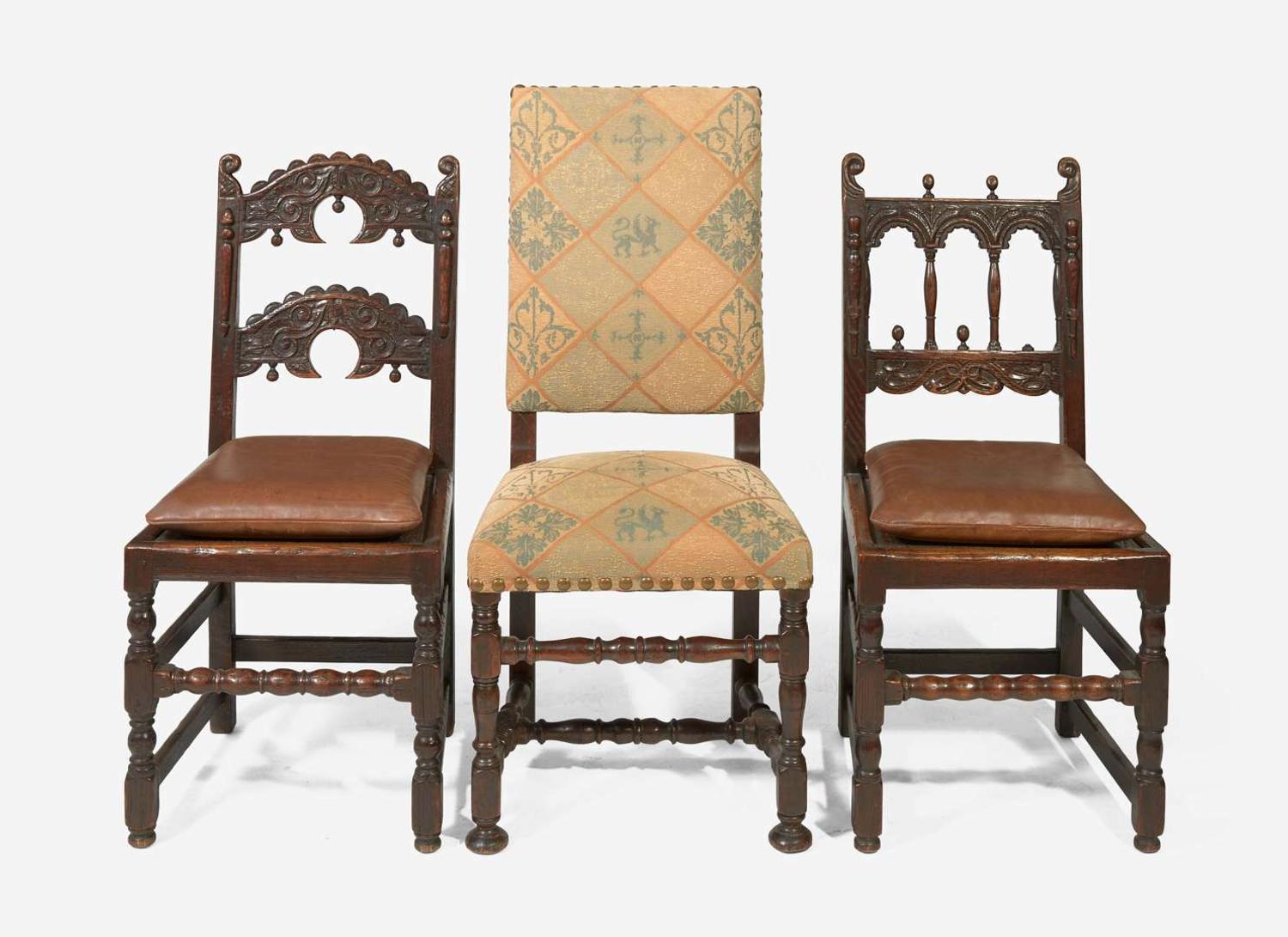An assembled group of eight Baroque Revival oak and walnut dining chairs, late 19th / early 20th century