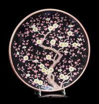 A Pair of Black Ground Cloisonné Vases and A Black Ground Polychrome Enameled Porcelain Charger