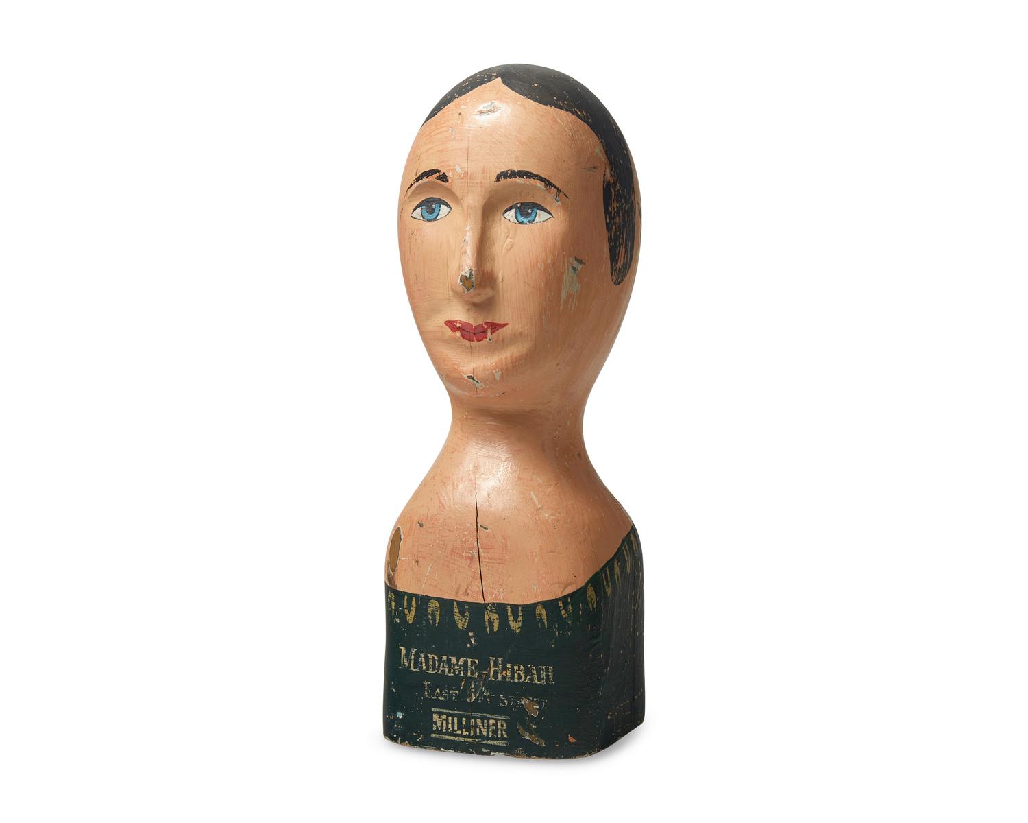 A Carved and Painted Milliner's Model Head
