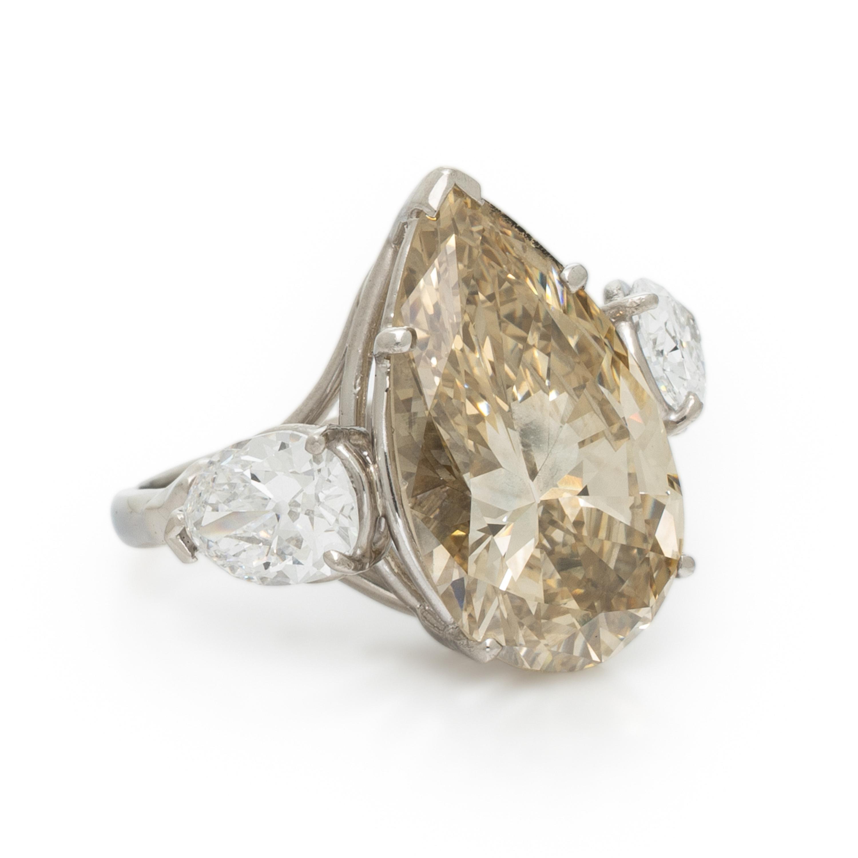 NATURAL FANCY BROWNISH YELLOW PEAR SHAPED DIAMOND AND DIAMOND RING