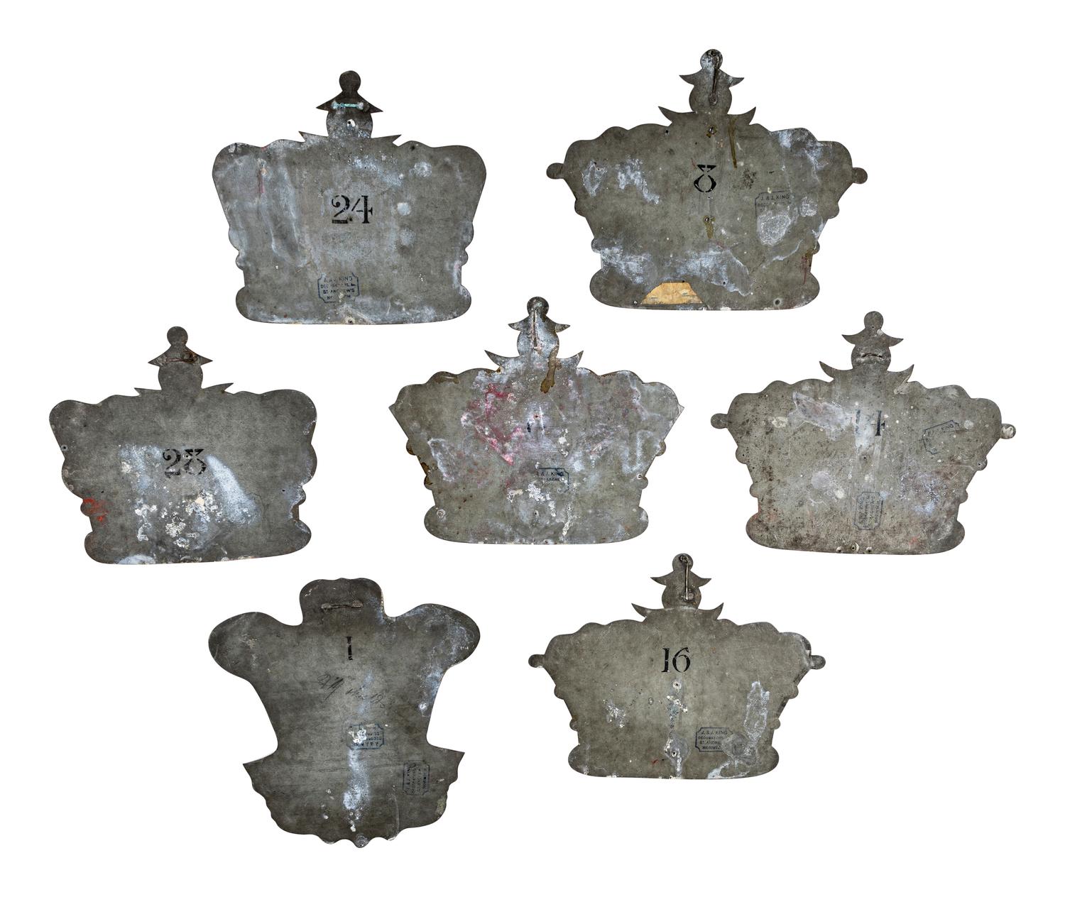 A Set of Seven Tôle Peinte Wall Appliques