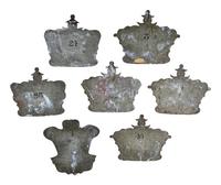 A Set of Seven Tôle Peinte Wall Appliques
