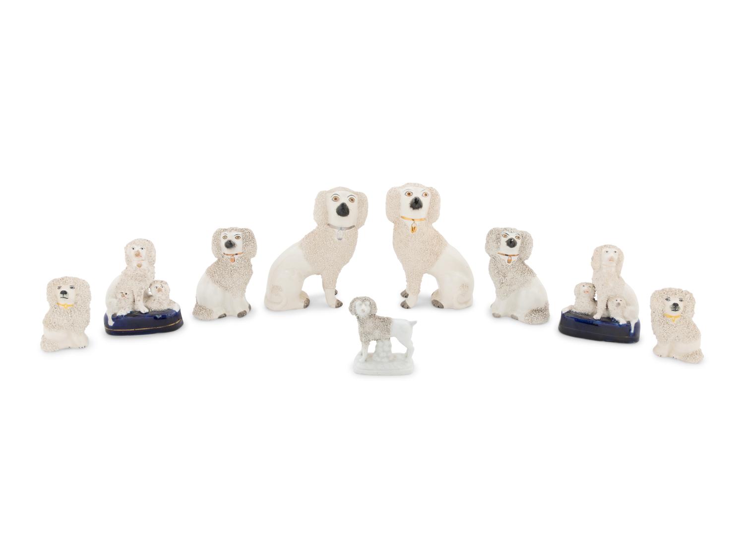 A Collection of Nine Staffordshire Glazed Poodles