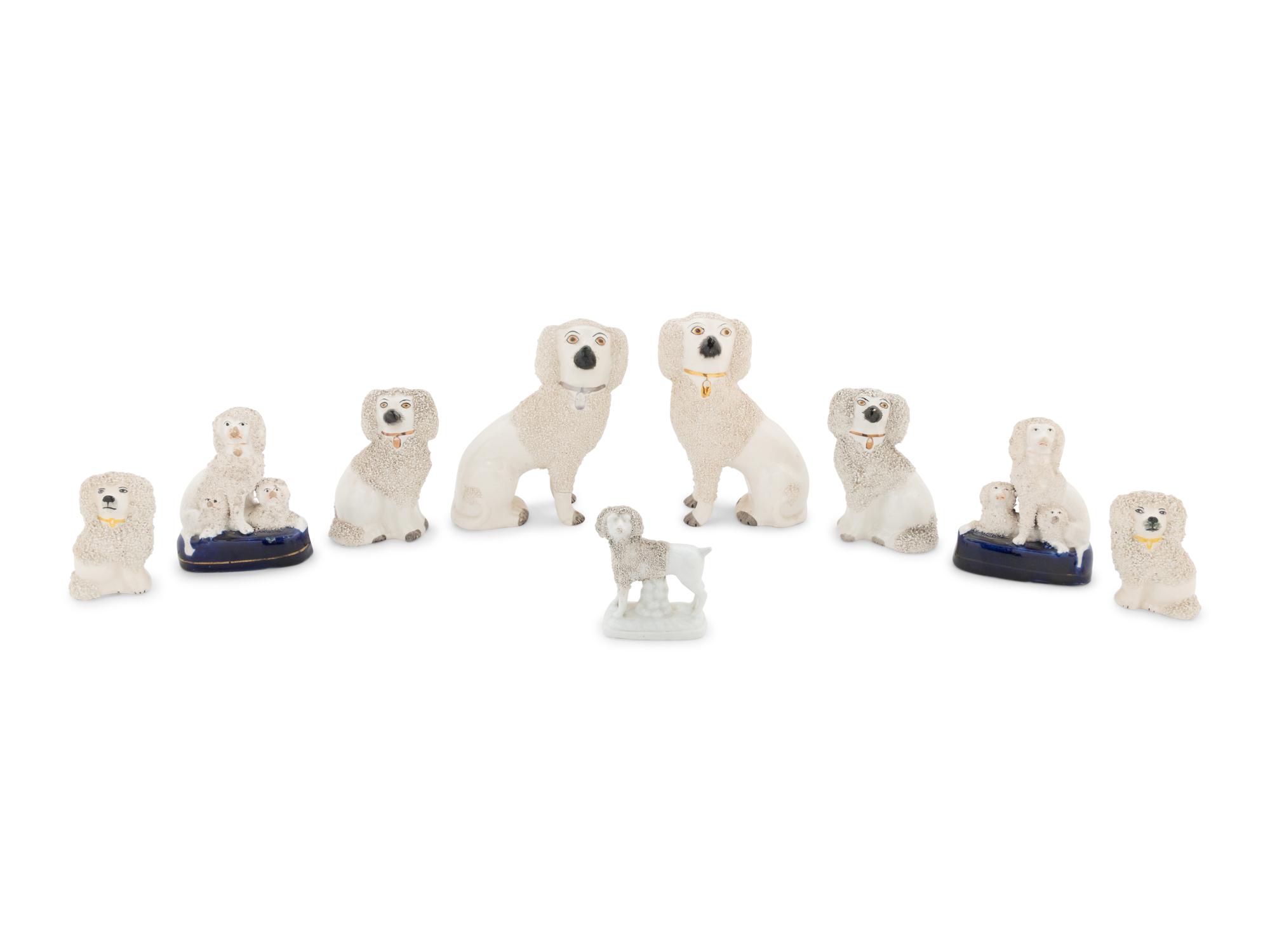 A Collection of Nine Staffordshire Glazed Poodles