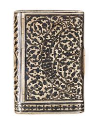 A Russian Niello Silver Cigarette Case, Moicye or Maxim Ivanov, 1896-1908, of rectangular form, the lid centered with Cyrillic script o