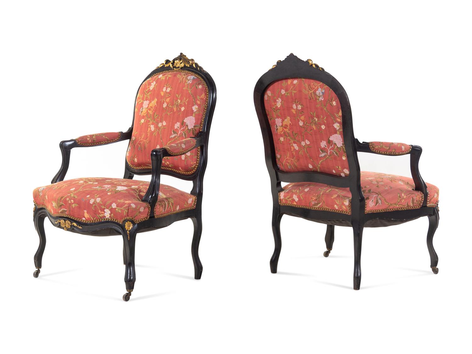 A Pair Louis XV Style Scalamandré Upholstered Parcel Gilt and Ebonized Fauteuils