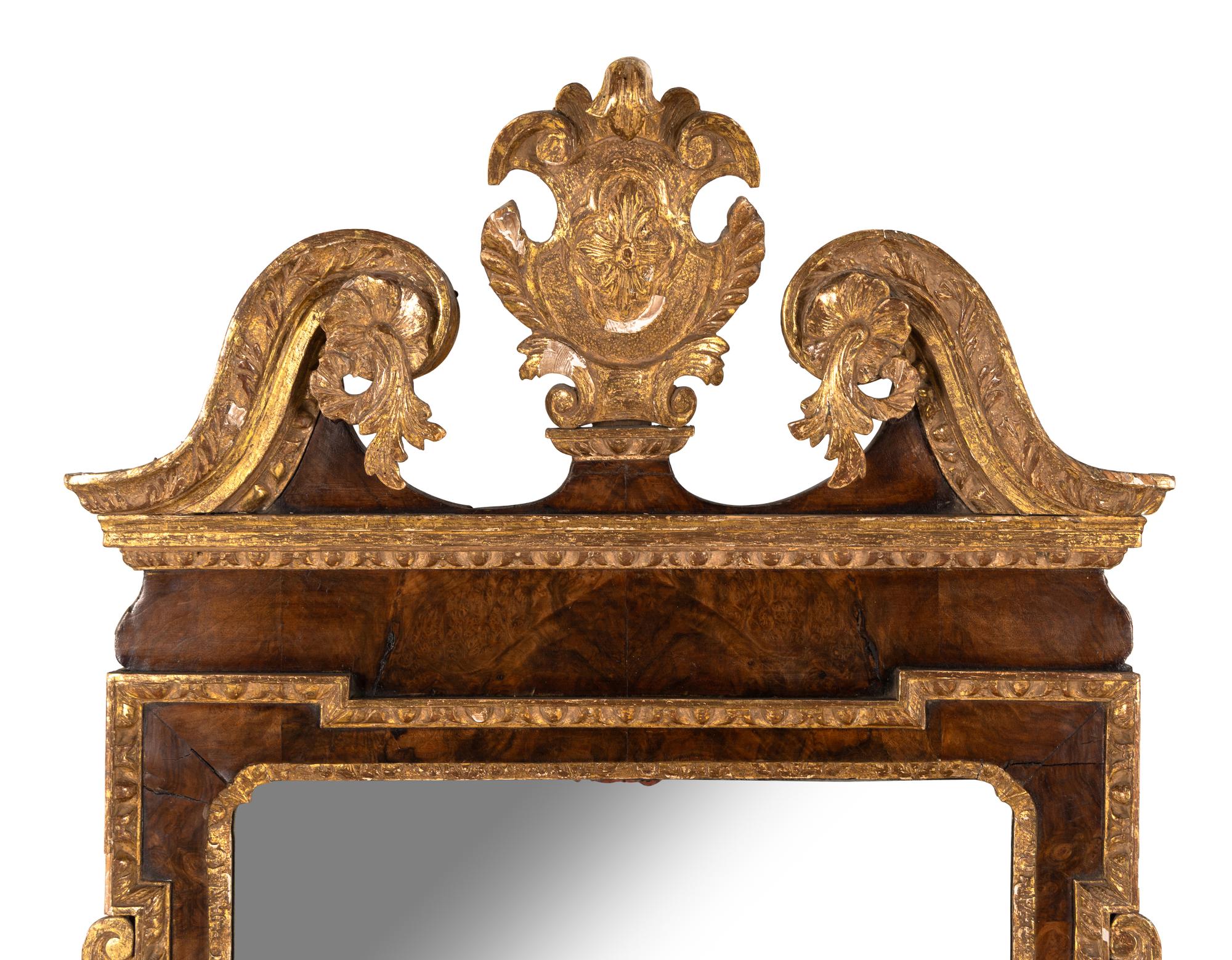 A George II Burl Walnut and Parcel Gilt Mirror