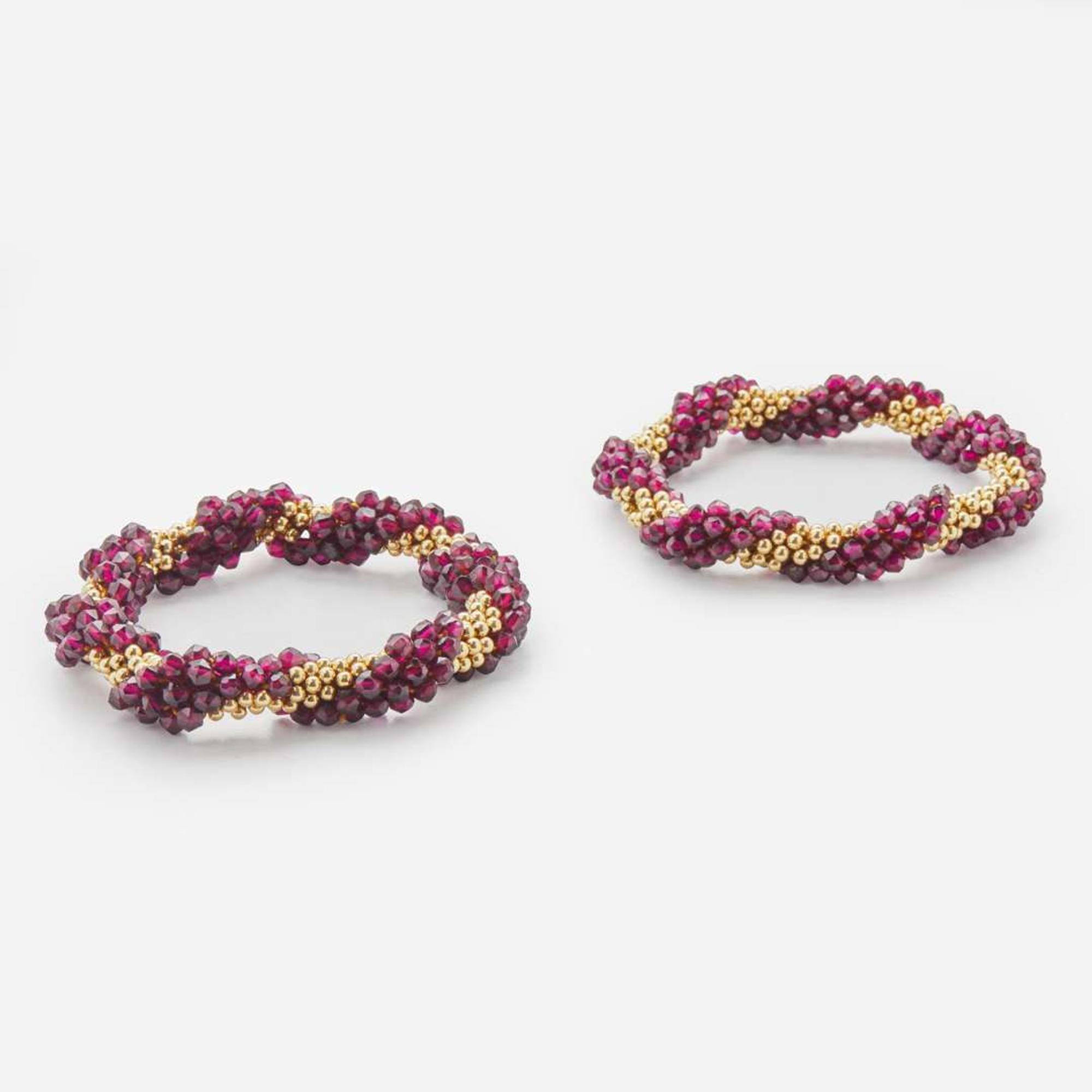 A Matching Set of Garnet and 14K Yellow Gold Bracelets and Earrings