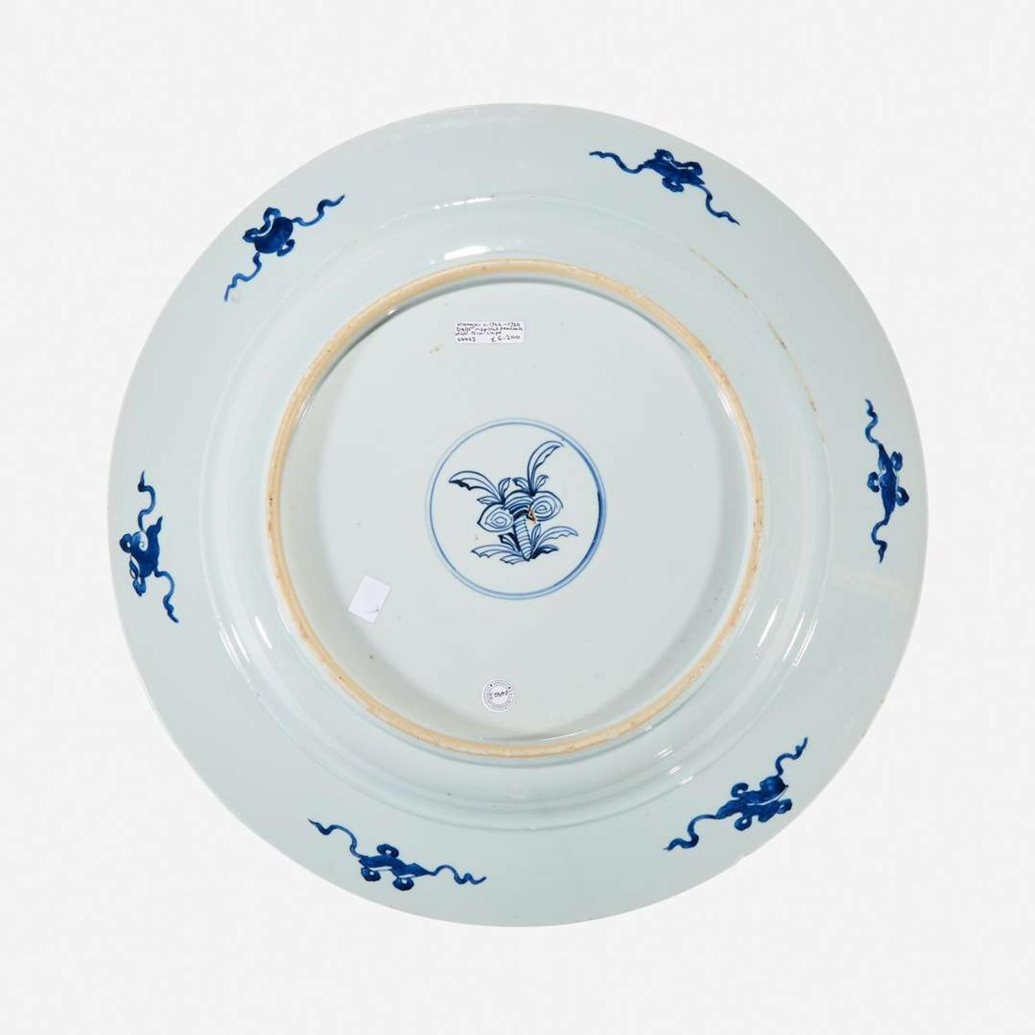 A large Chinese blue and white “Peacock and Rosette” charger Kangxi period