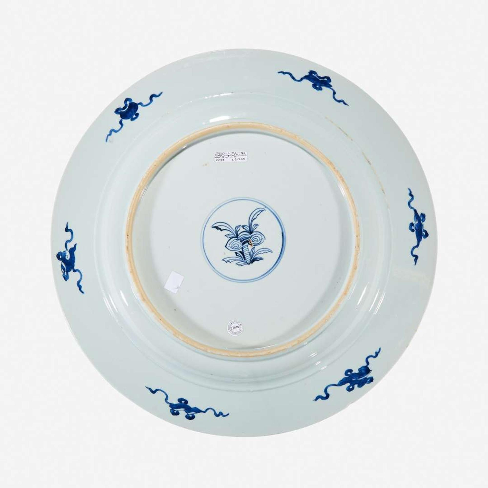 A large Chinese blue and white “Peacock and Rosette” charger Kangxi period