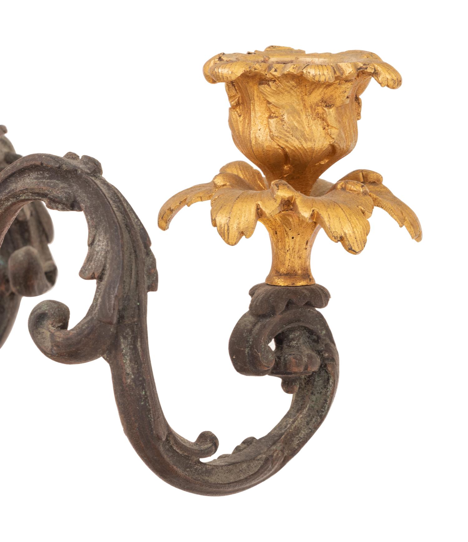 A Pair of Continental Gilt and Patinated Bronze Four-Light Candelabra