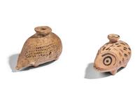 Two Greek Pottery Aryballoi in the form of Hedgehogs