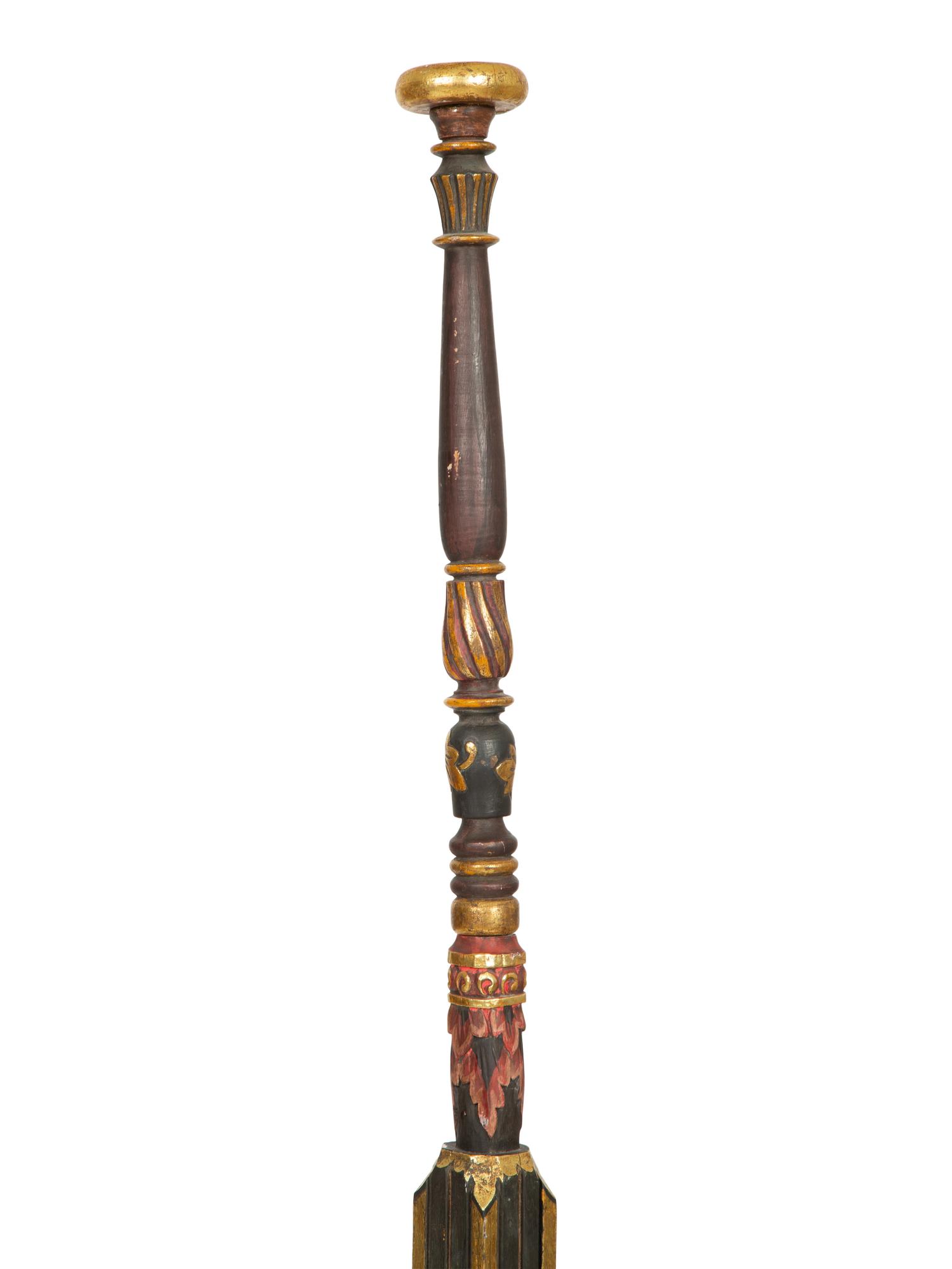 A Pair of Neoclassical Style Black and Gilt Torcheres