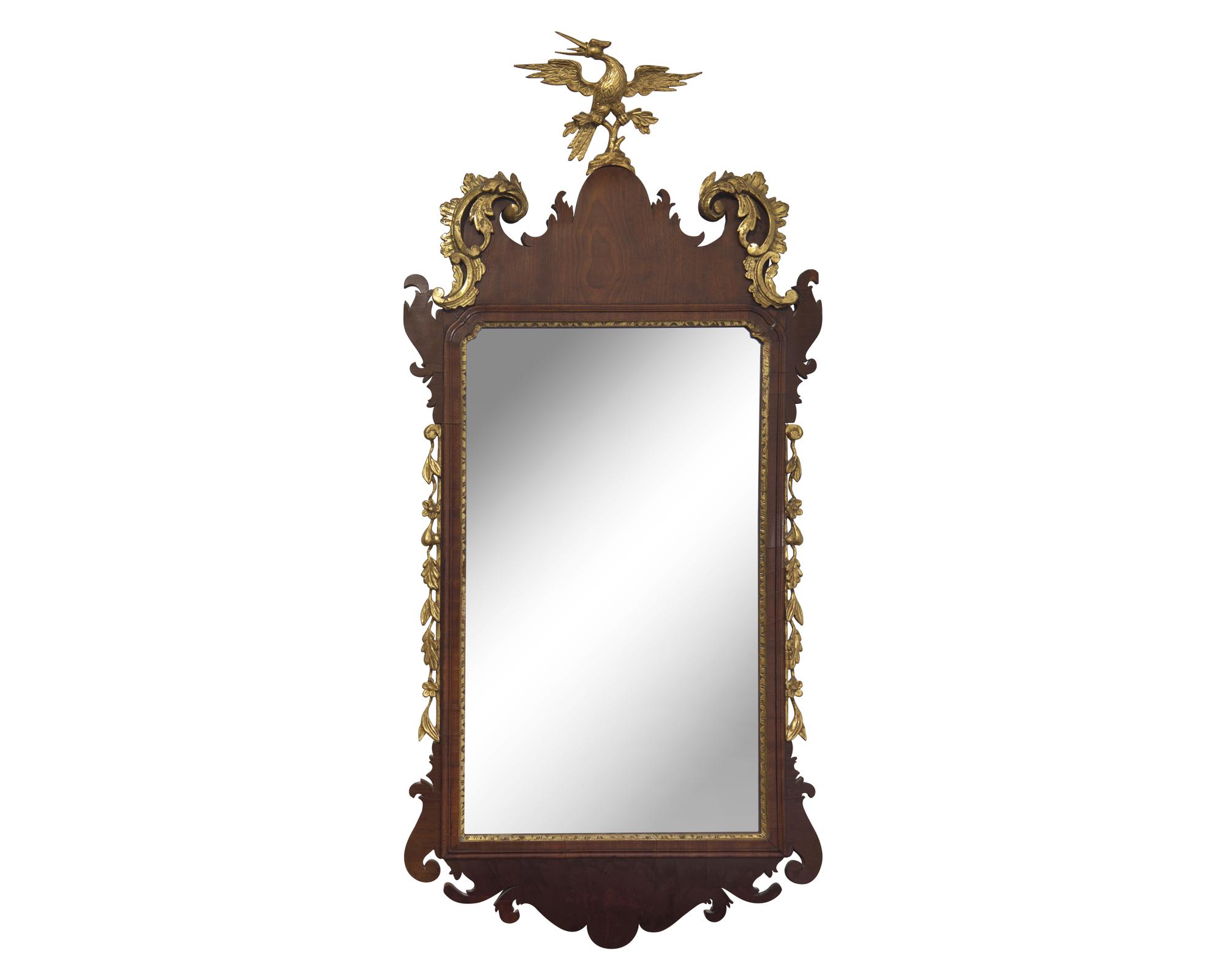 A Chippendale Mahogany and Parcel-Gilt Looking Glass, Circa 1770