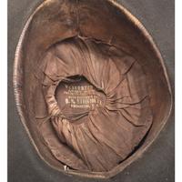 Two Army slouch hats identified to Captain Charles E. Nash, Company F, 19th Maine Infantry.