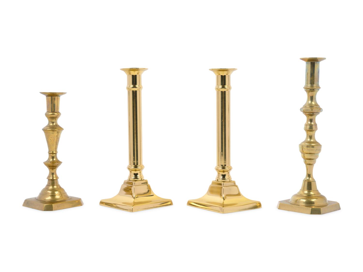A Group of Brass Candlesticks
