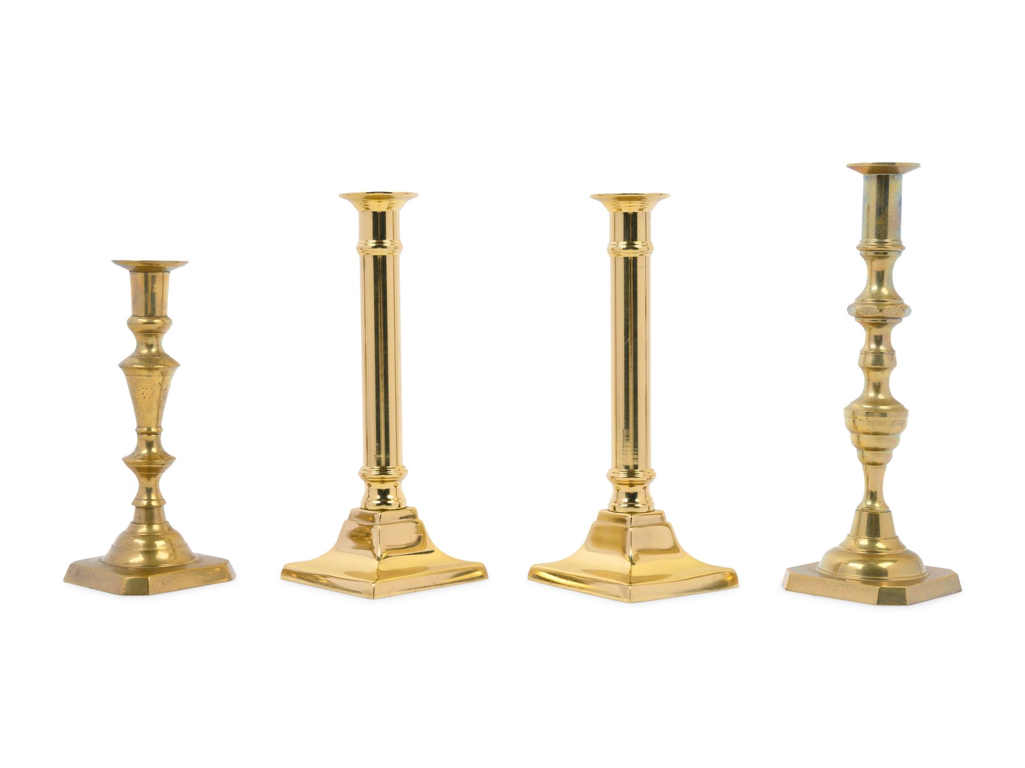 A Group of Brass Candlesticks