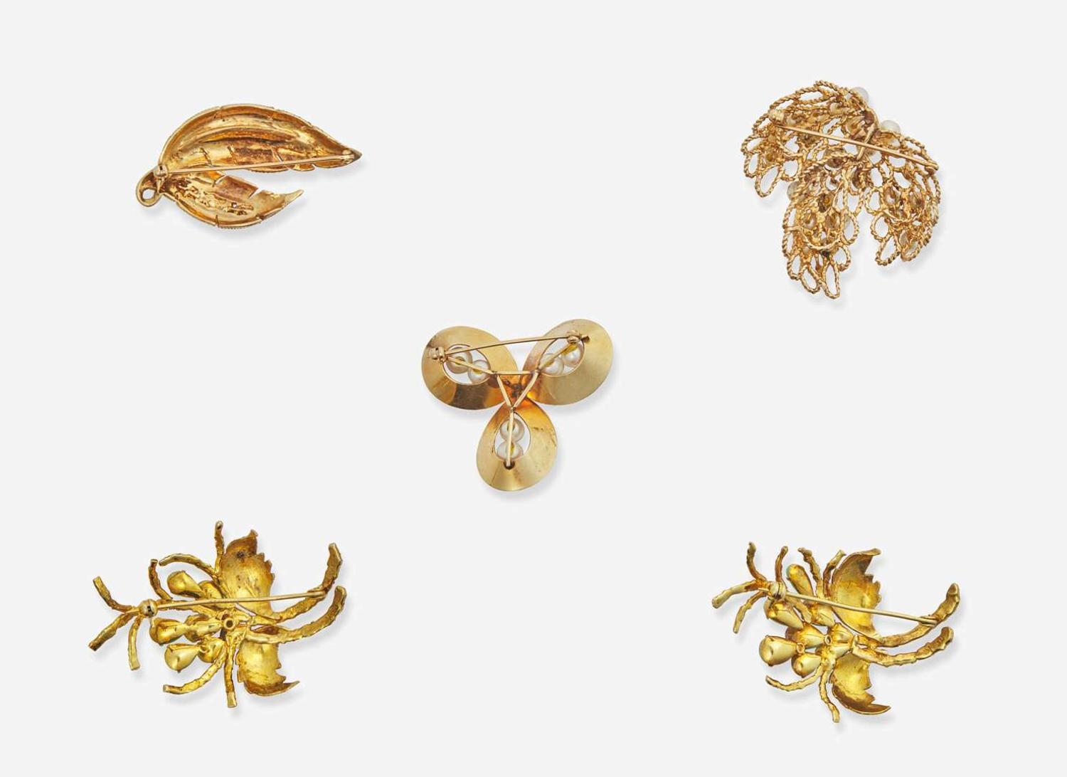 An Assortment of Yellow Gold and Gemstone Brooches