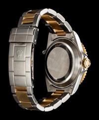 ROLEX, REF. 16613 STAINLESS STEEL AND 18K YELLOW GOLD 'SUBMARINER' DATE WATCH