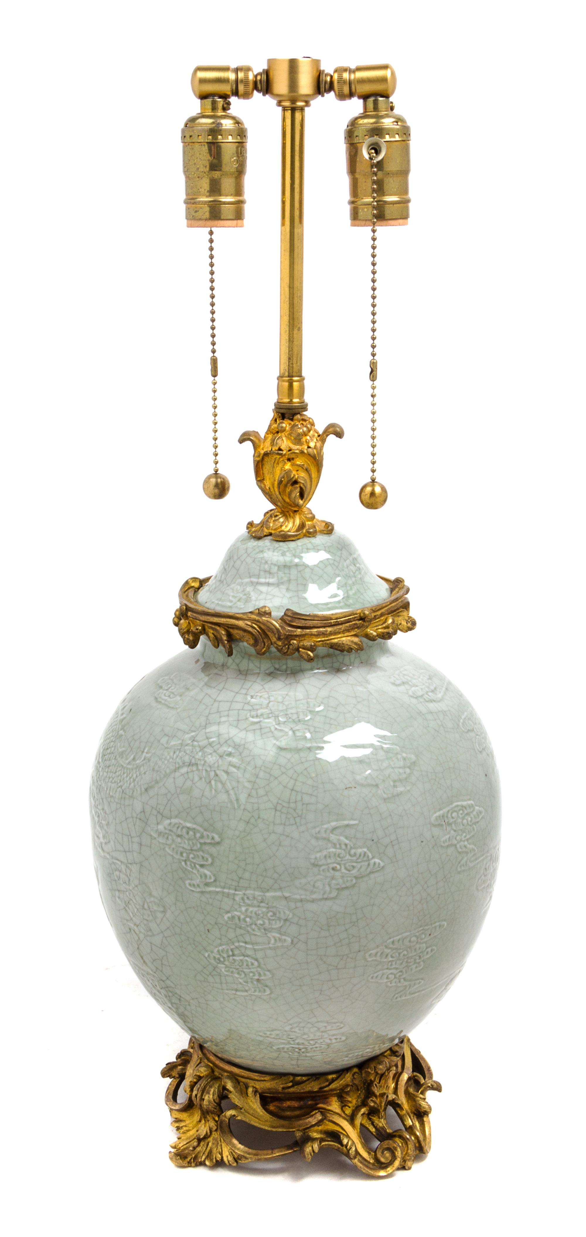A Gilt Bronze Mounted Chinese Celadon Vase Height 23 1/2 inches overall. — MID-19TH CENTURY