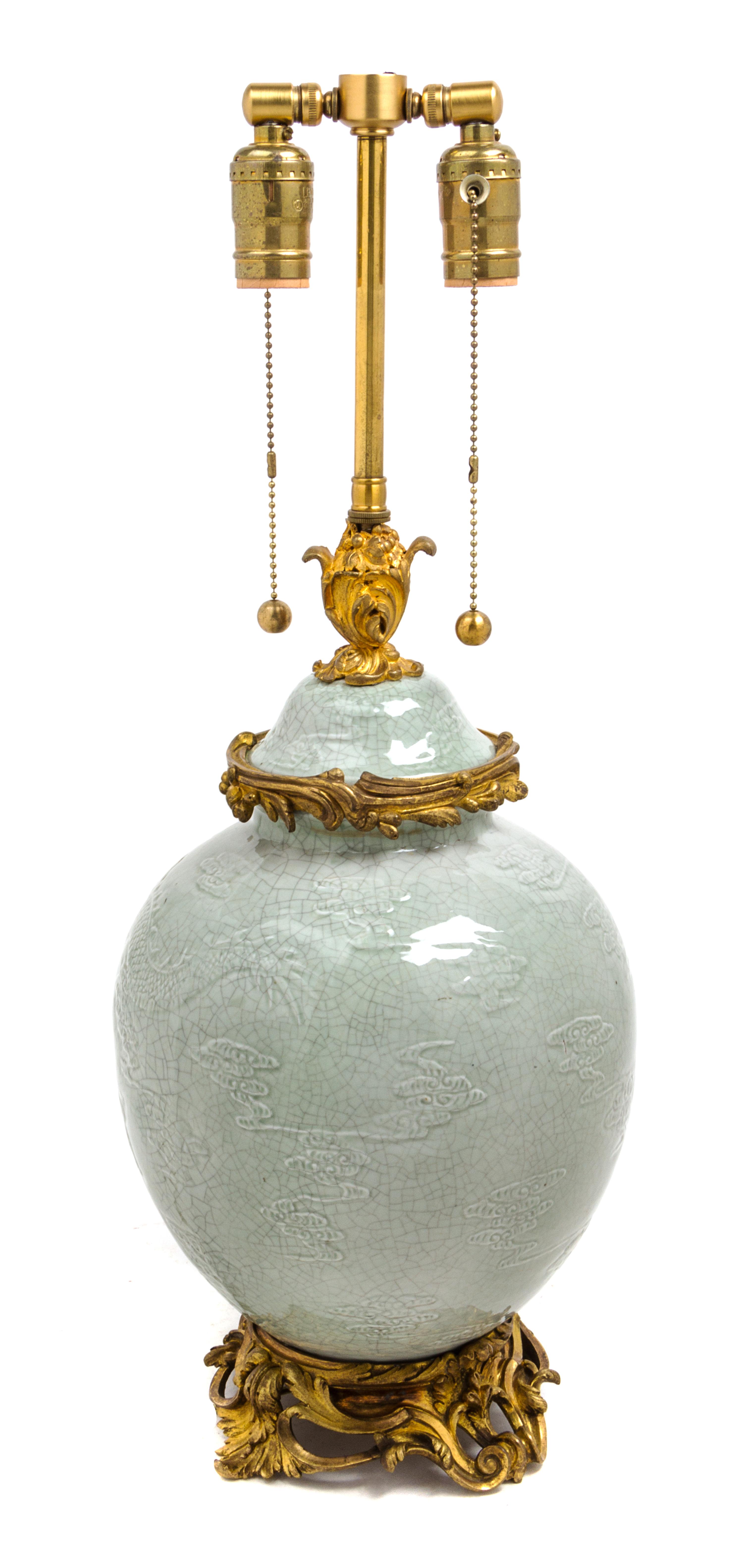 A Gilt Bronze Mounted Chinese Celadon Vase Height 23 1/2 inches overall. — MID-19TH CENTURY