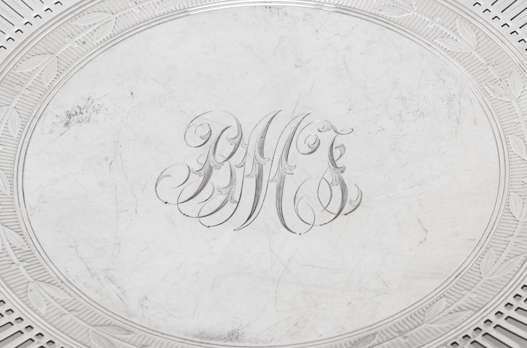 comprising a reticulated cake tray, a scalloped plate, a cream and sugar set, and a bowl with attached underplate.