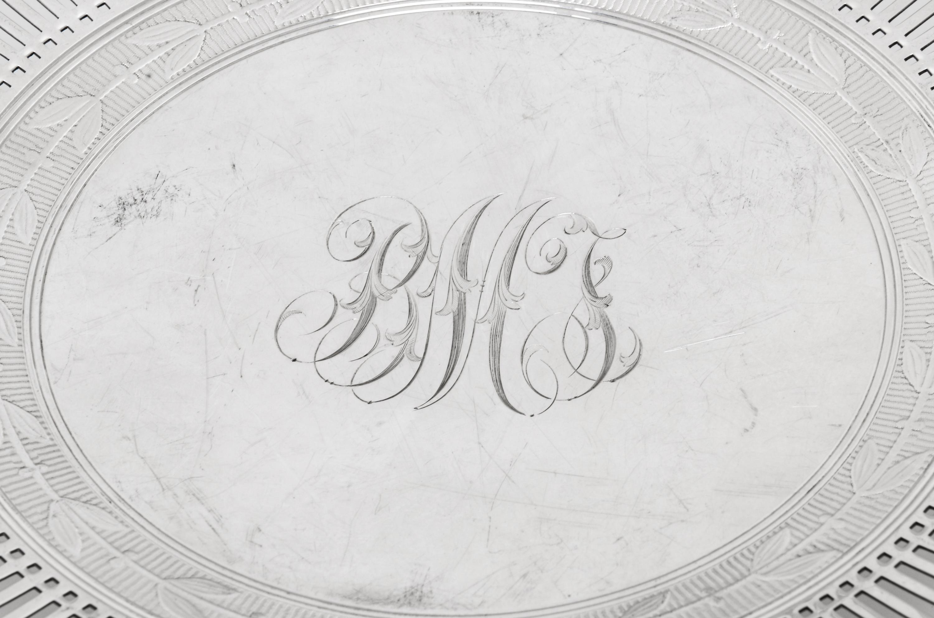 comprising a reticulated cake tray, a scalloped plate, a cream and sugar set, and a bowl with attached underplate.