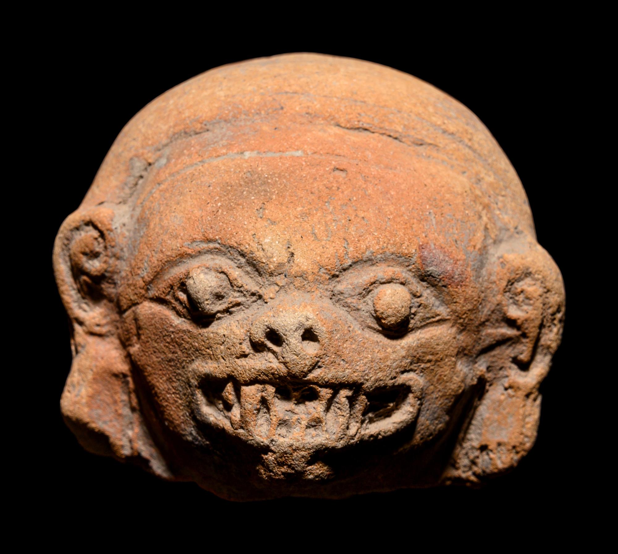 A Group of Ten Tumaco Terracotta Heads