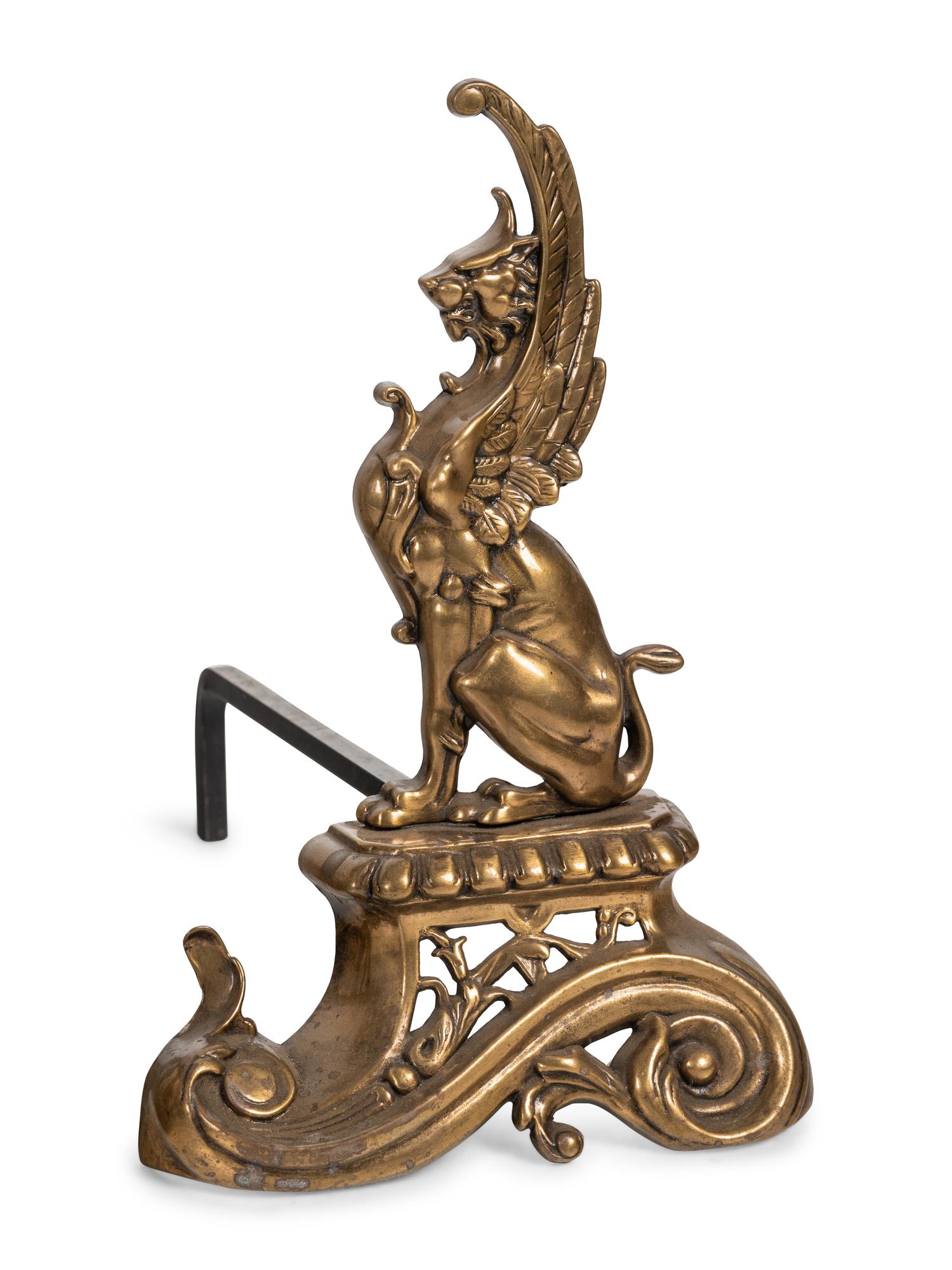 A Neoclassical Style Brass Fire Fender and Chenets with Griffins