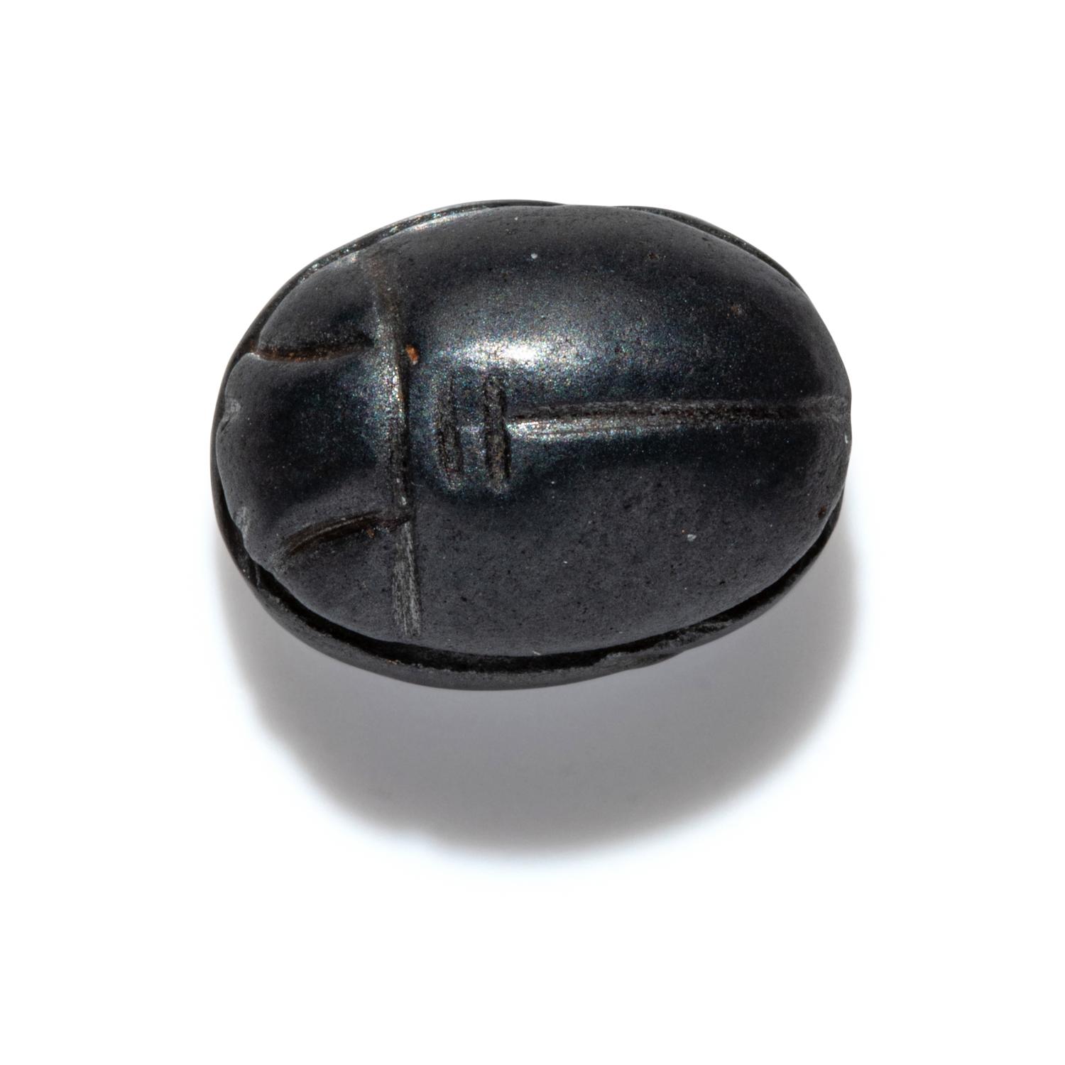 A Phoenician Hematite Scarab with Two Ibexes