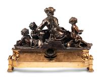 A French Gilt and Patinated Bronze Figural Mantel Clock