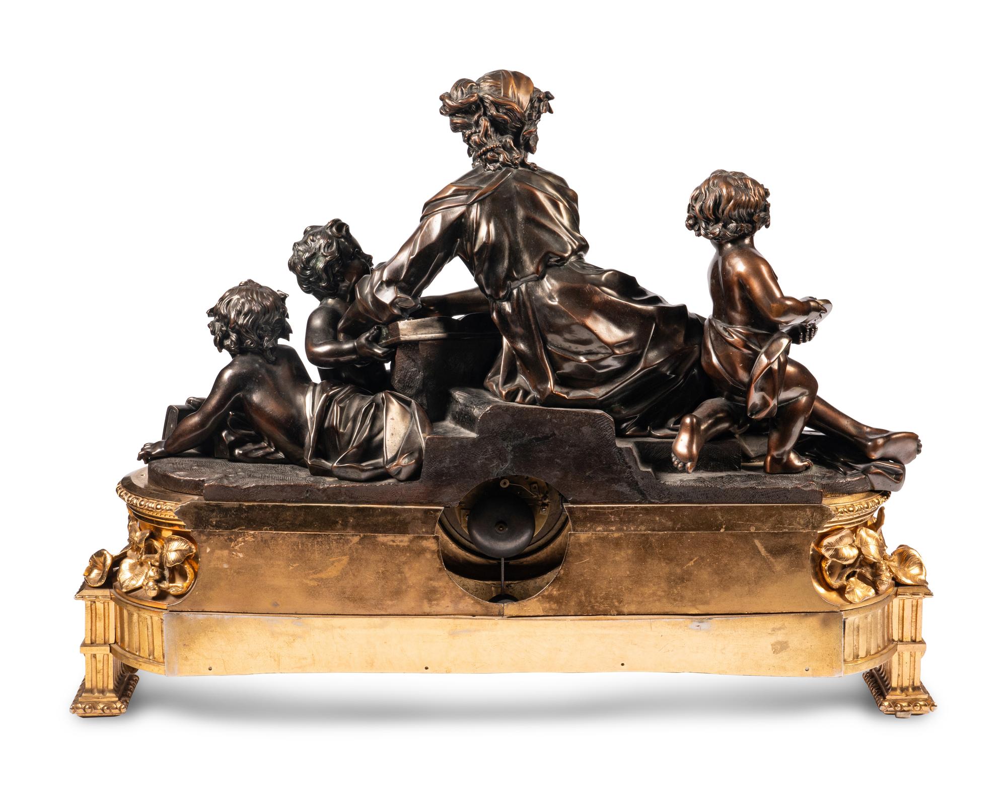 A French Gilt and Patinated Bronze Figural Mantel Clock