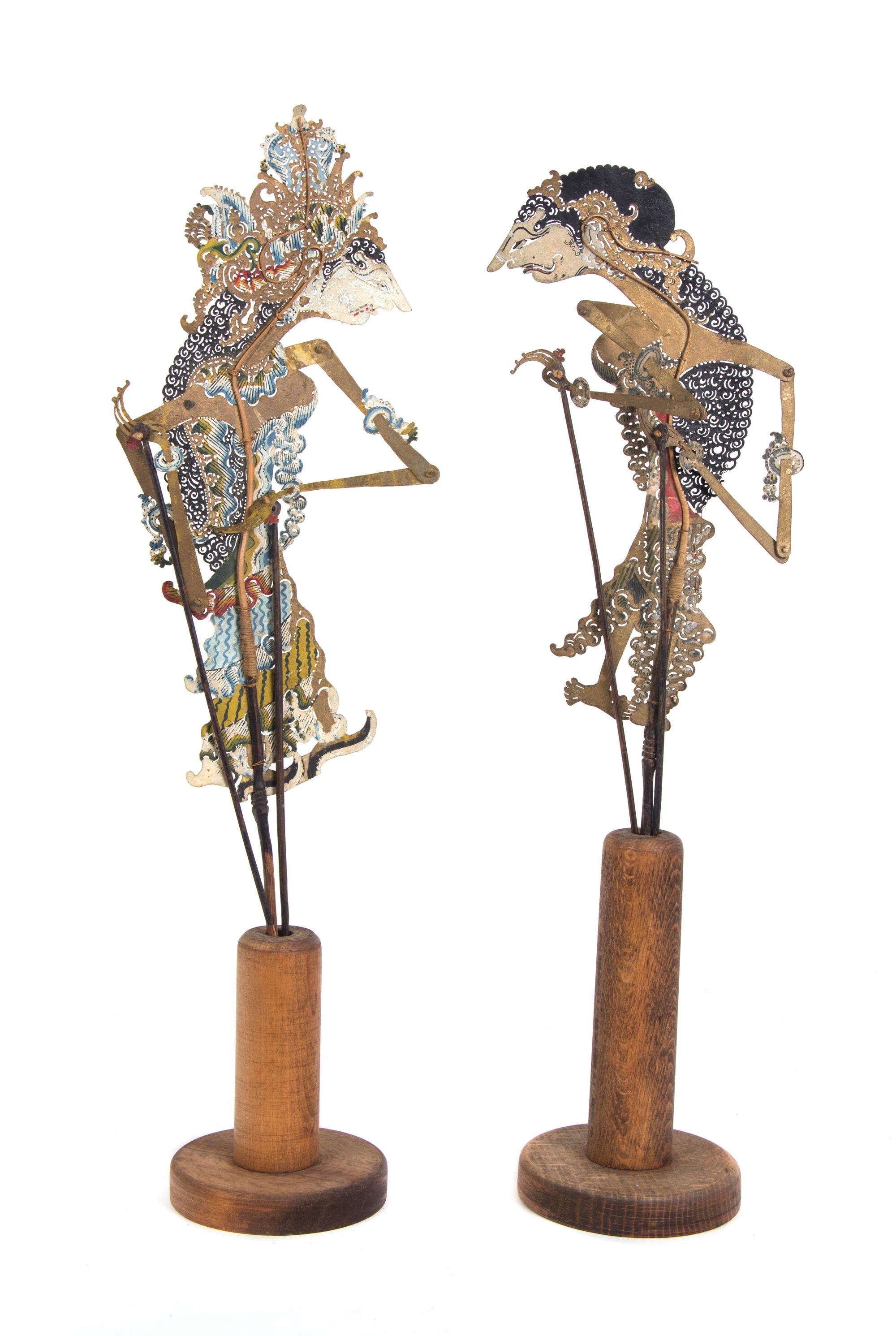 A Collection of Four Indonesian Wayang Kulit Shadow Puppets Height of tallest 33 inches. — 20TH CENTURY