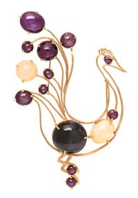 A Yellow Gold, Star Ruby, Moonstone and Black Star Sapphire Brooch, 133.80 dwts.
