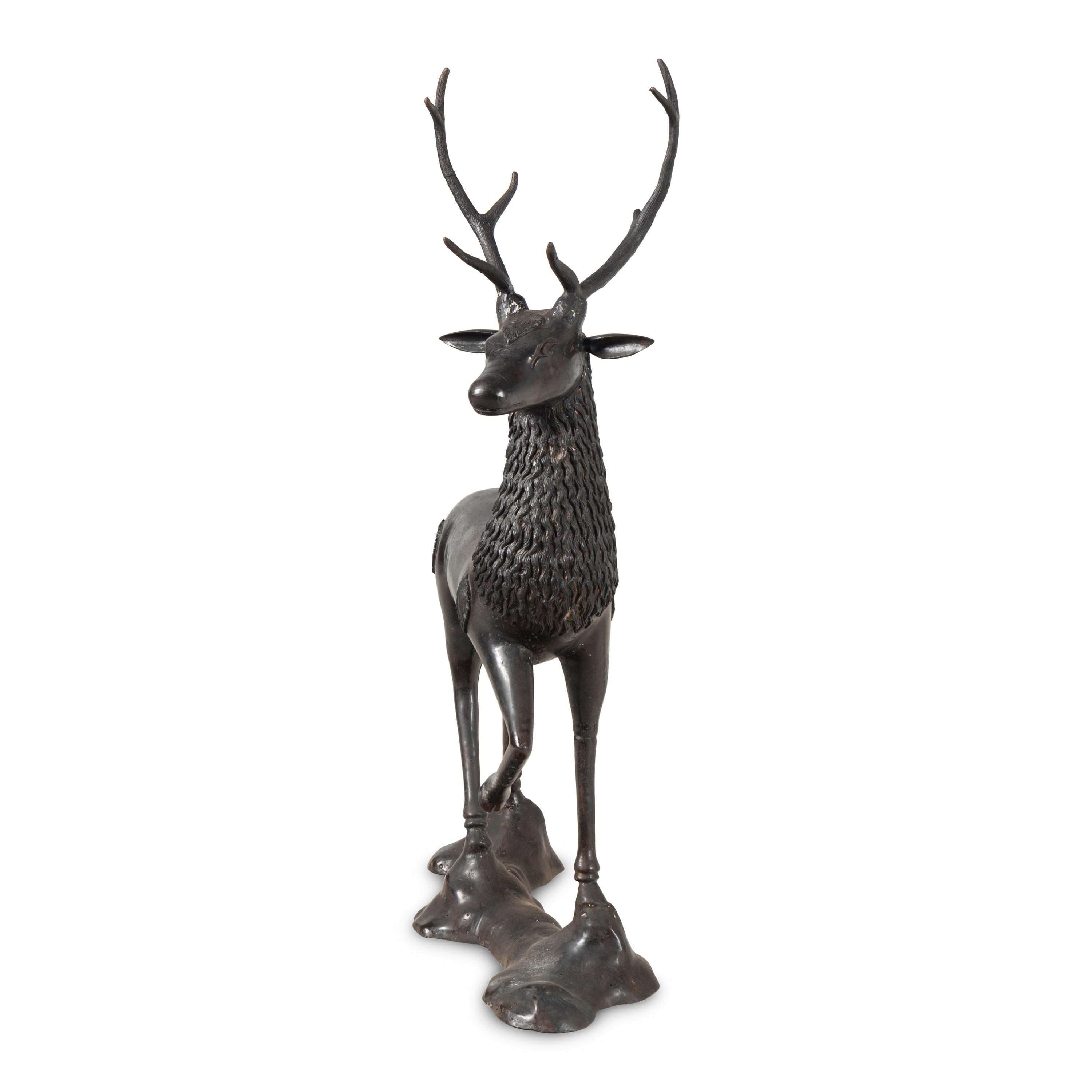 A Pair of Bronze Models of Stags