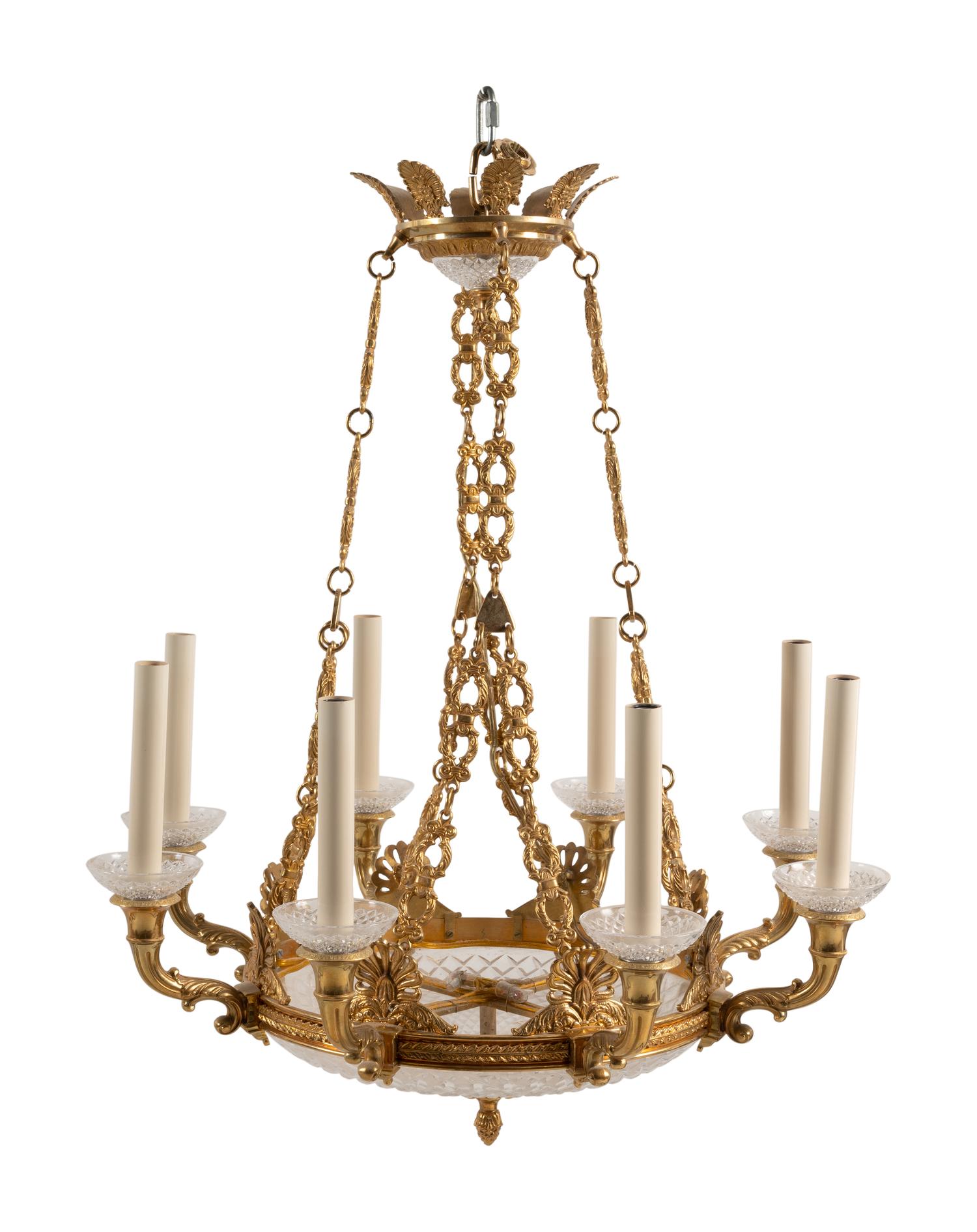 An Empire Style Gilt Metal and Cut Glass Eight-Light Chandelier