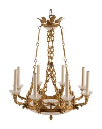 An Empire Style Gilt Metal and Cut Glass Eight-Light Chandelier