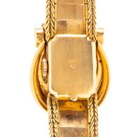 MOVADO, 18K YELLOW GOLD SURPRISE WATCH