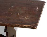 A Baroque Style Stained Fruitwood Trestle Table