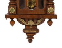 An Austrian Carved Oak Regulator Clock