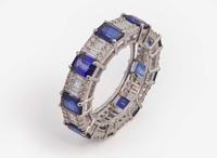 An 18K White Gold, Sapphire, and Diamond Eternity Band