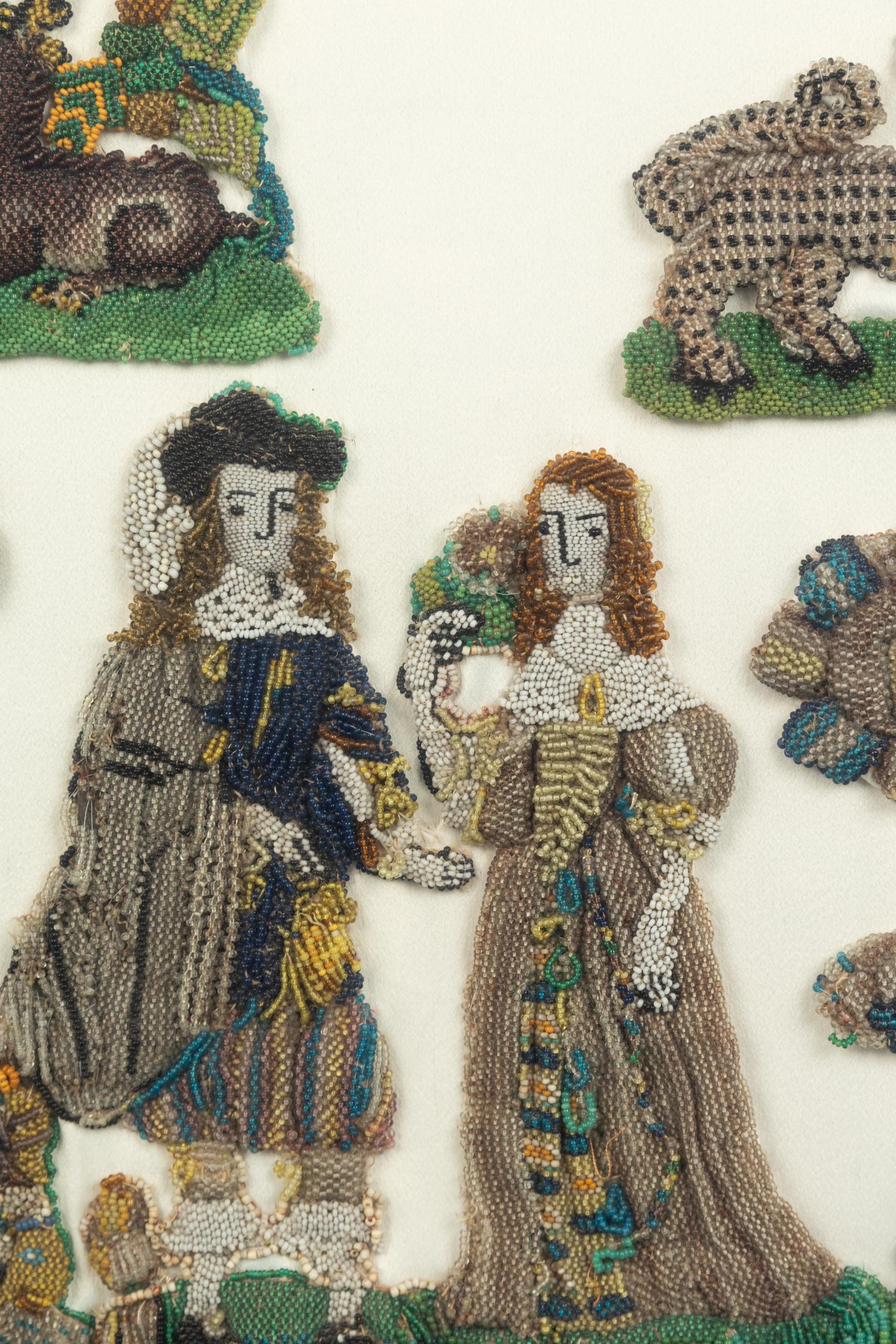A Group of English Beadworks in a Flemish Tortoise Shell and Ebonized Ripple-Molded Frame