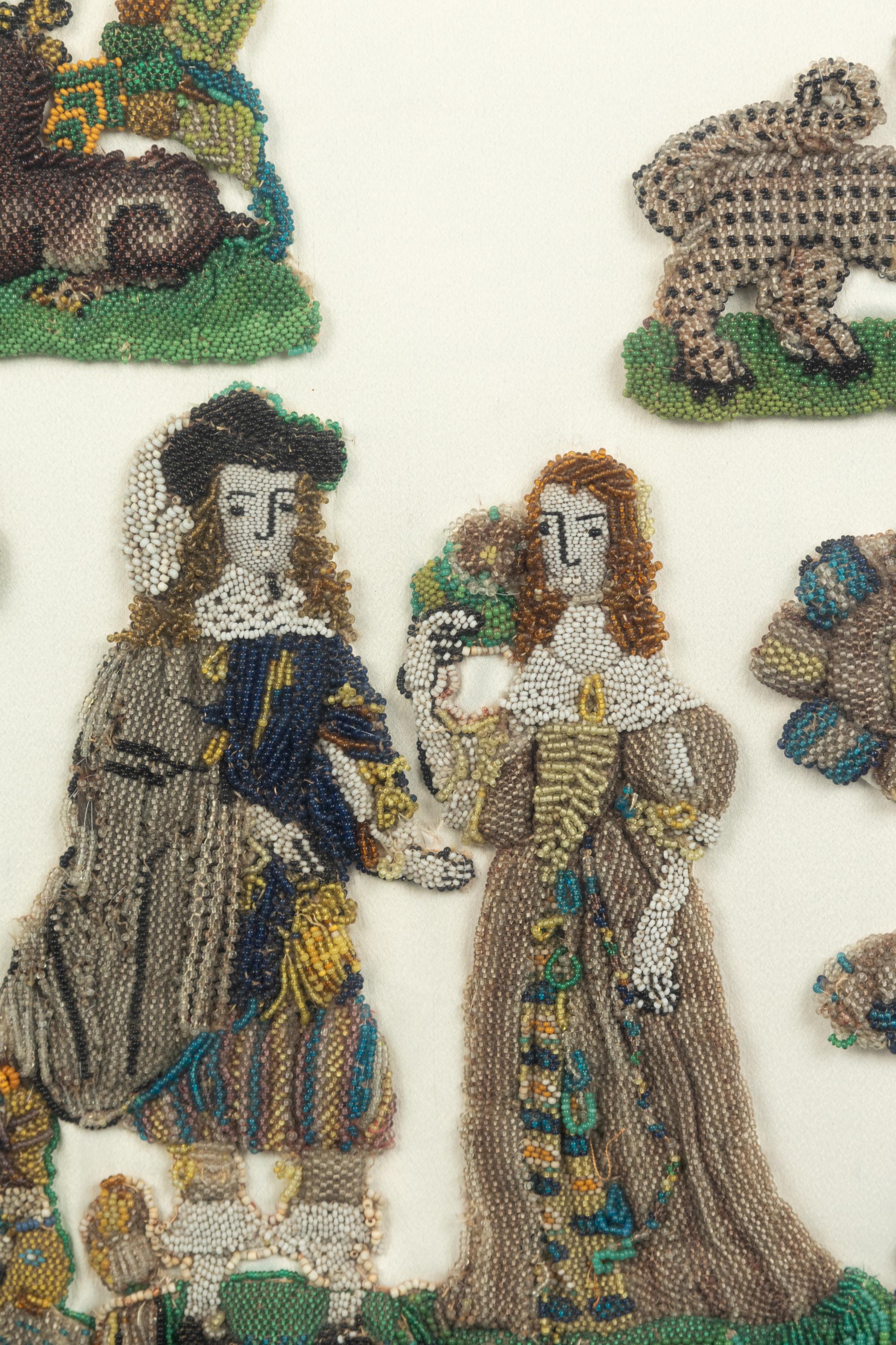 A Group of English Beadworks in a Flemish Tortoise Shell and Ebonized Ripple-Molded Frame