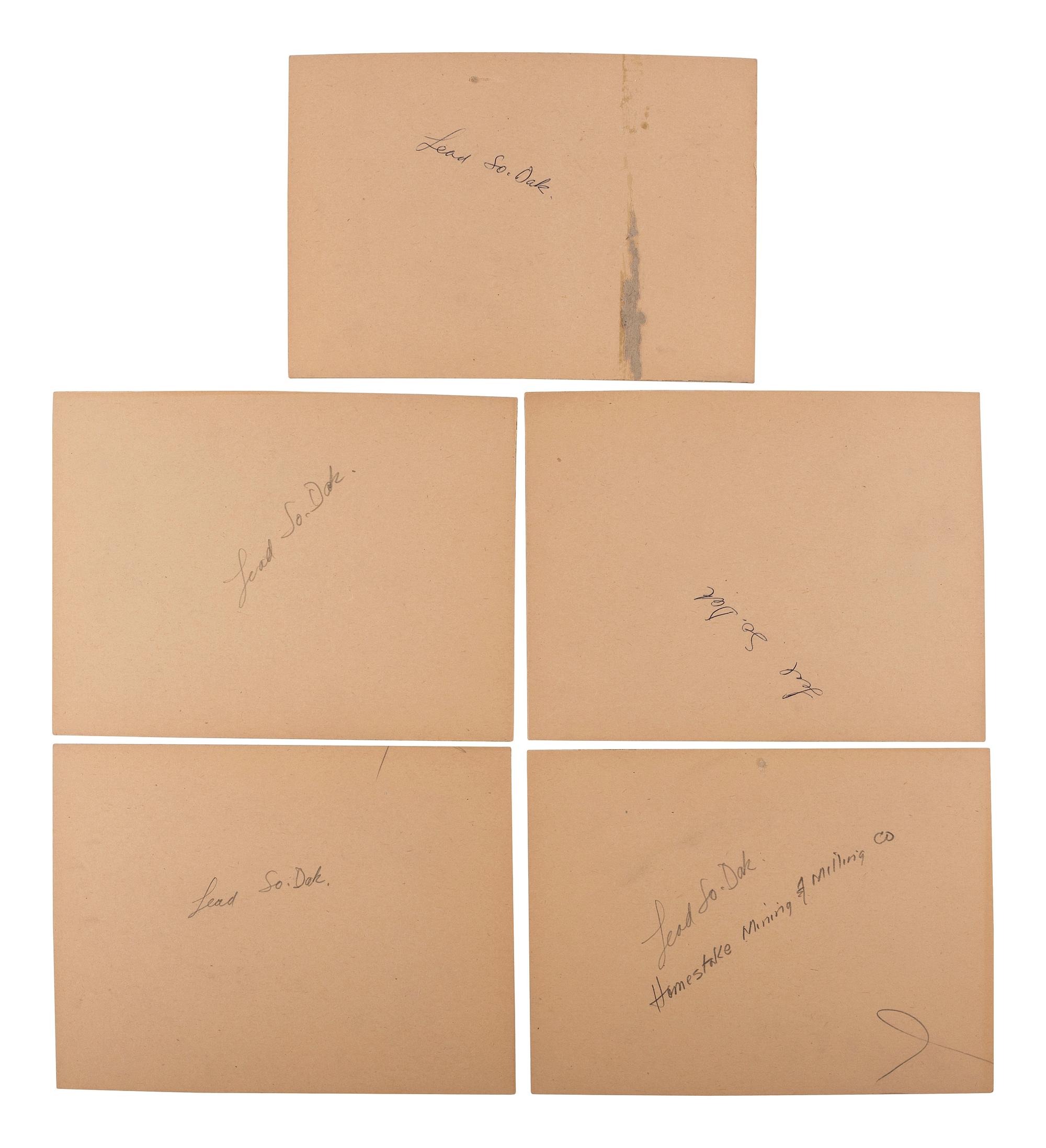 [SOUTH DAKOTA]. A group of 15 Lead, South Dakota, town and mining photographs, comprising: