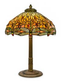 A Tiffany Studios Favrile Glass and Gilt Bronze Drophead Dragonfly Table Lamp Diameter of shade 22 1/2 inches, height overall 31 inches