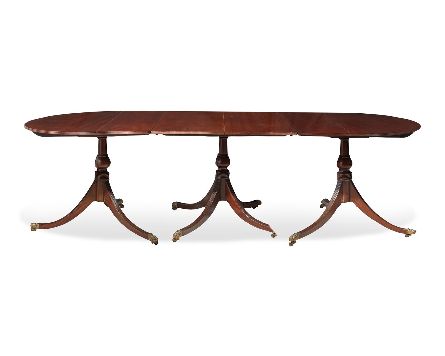 A George III three-part mahogany dining table, circa 1800